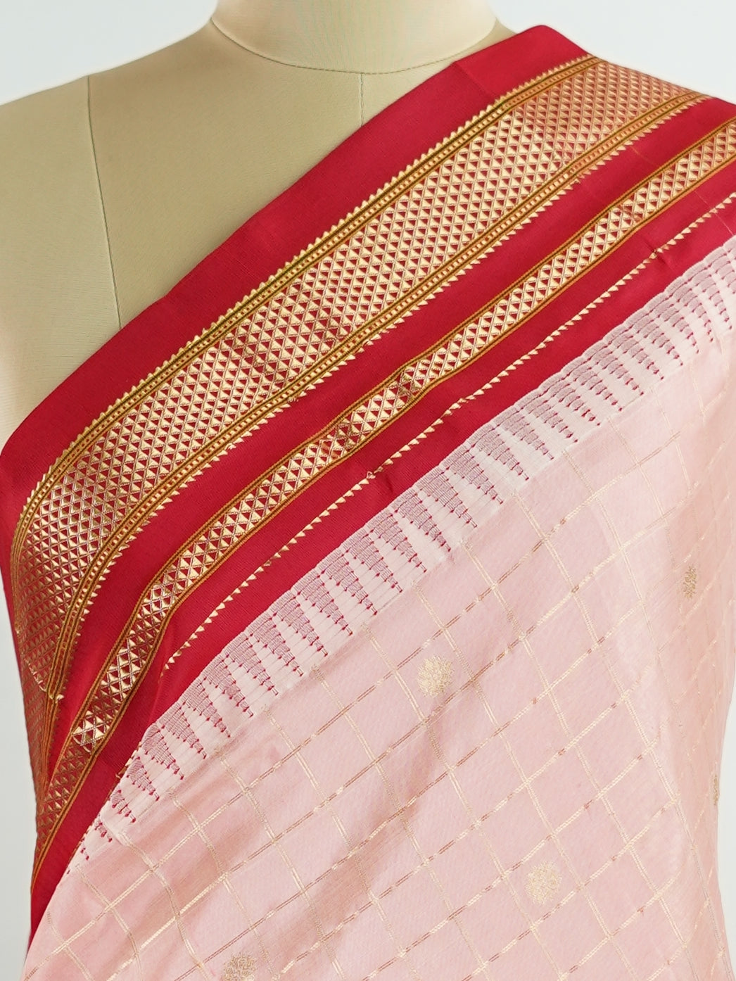 Narayanpet Narayanpet sarees with checks and buttis showcase a perfect blend of tradition and simplicity, featuring intricate motifs woven over classic check patterns.
Their vibrant colors and fine craftsmanship make them elegant choices for any occasion.
 Jaganmatha - Manoranjitham Weaves - Handloom Store