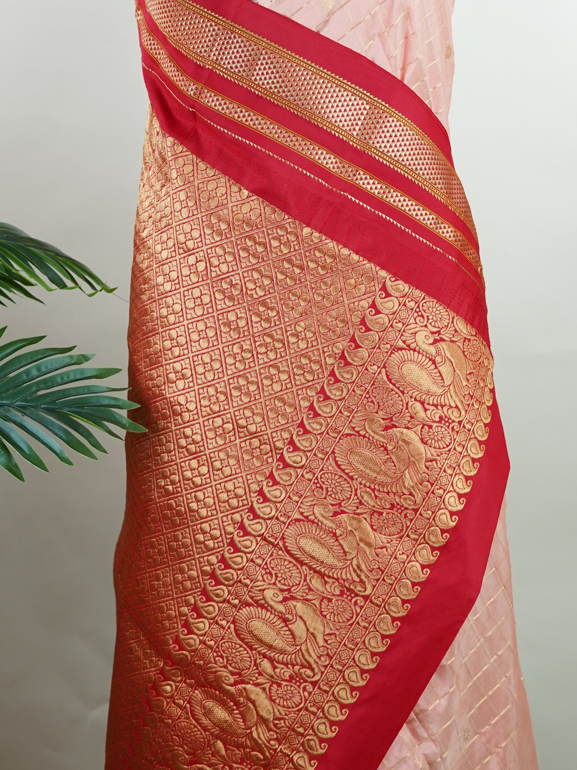 Narayanpet Narayanpet sarees with checks and buttis showcase a perfect blend of tradition and simplicity, featuring intricate motifs woven over classic check patterns.
Their vibrant colors and fine craftsmanship make them elegant choices for any occasion.
 Jaganmatha - Manoranjitham Weaves - Handloom Store