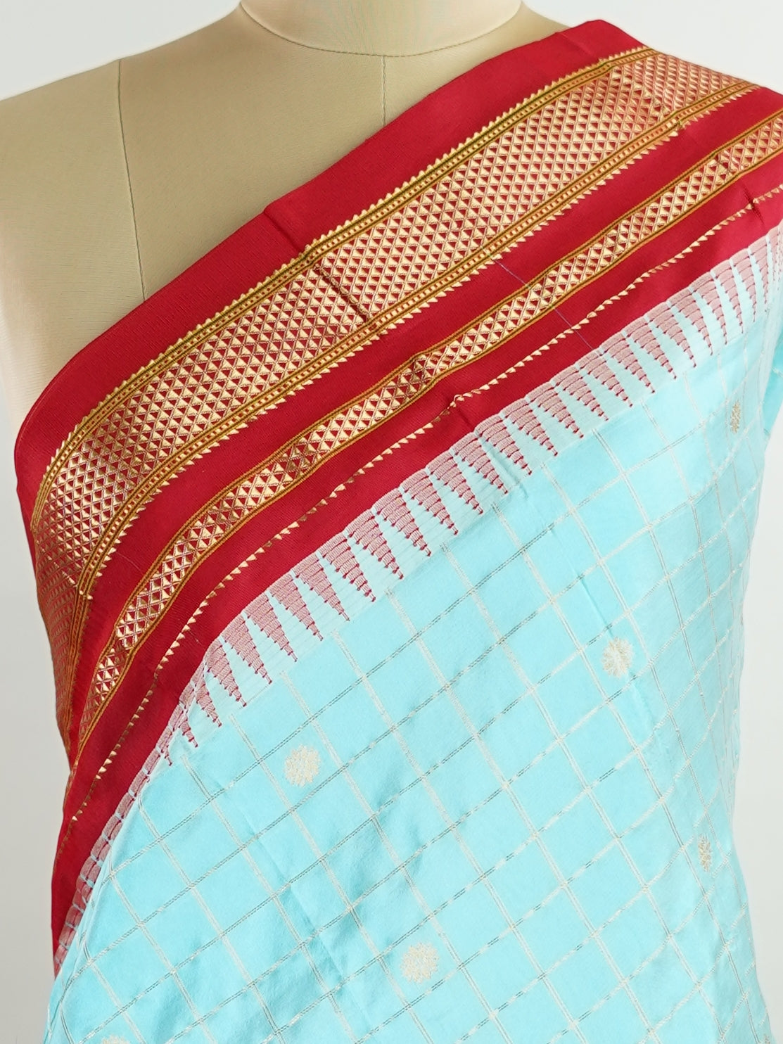 Narayanpet Narayanpet sarees with checks and buttis showcase a perfect blend of tradition and simplicity, featuring intricate motifs woven over classic check patterns.
Their vibrant colors and fine craftsmanship make them elegant choices for any occasion.
 Soundarya - Manoranjitham Weaves - Handloom Store