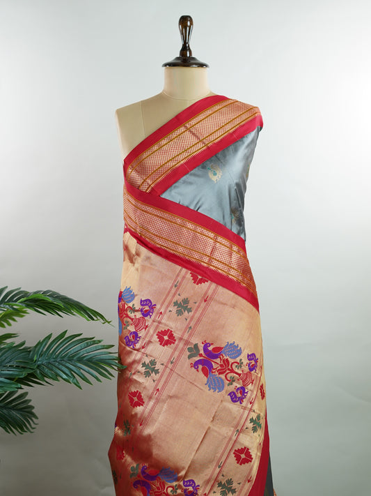 Narayanpet Narayanpet sarees feature elegant plain bodies adorned with delicate buttas, complemented by rich Paithani-style pallus.
These sarees beautifully combine simplicity and tradition, showcasing the perfect harmony of Narayanpet weaving and Paithani artistry. Tripura Bhairavi - Manoranjitham Weaves - Handloom Store