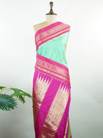 Narayanpet Narayanpet plain sarees are known for their elegant simplicity, featuring rich cotton or silk textures with contrasting borders.
They beautifully blend traditional craftsmanship with everyday comfort, making them perfect for both casual and festive wear. Shringara - Manoranjitham Weaves - Handloom Store