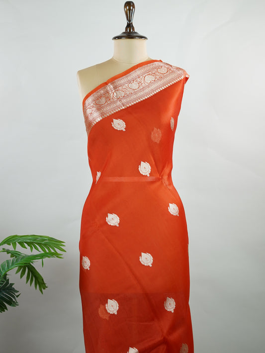 Katan This kora saree features delicate woven buttis and offers a light, comfortable drape. Parijata - Manoranjitham Weaves - Handloom Store