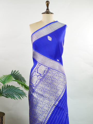 Katan This kora saree features delicate woven buttis and offers a light, comfortable drape. Isha - Banarasi Kora Saree | Woven Buttas - Manoranjitham Weaves - Handloom Store