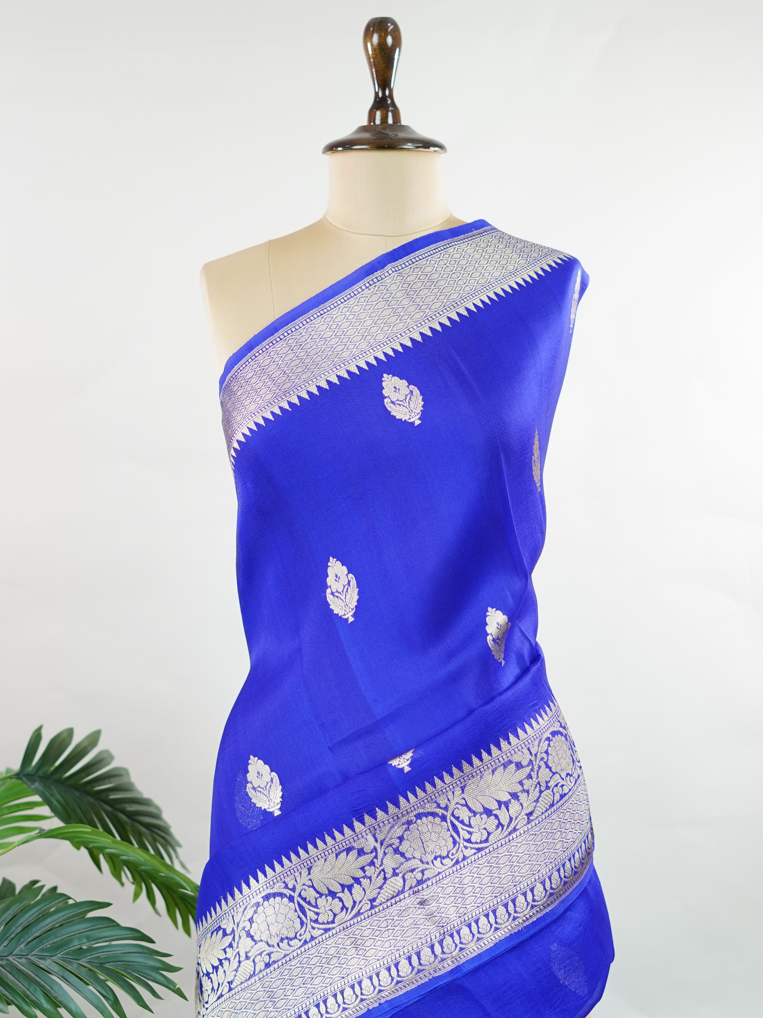 Katan This kora saree features delicate woven buttis and offers a light, comfortable drape. Isha - Banarasi Kora Saree | Woven Buttas - Manoranjitham Weaves - Handloom Store
