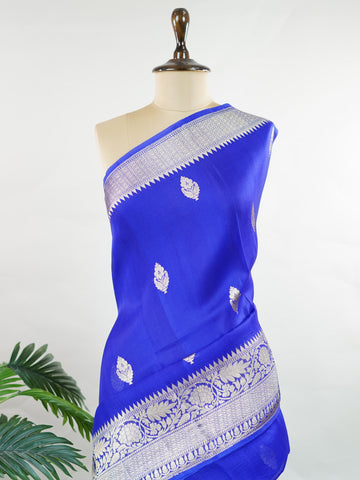 Katan This kora saree features delicate woven buttis and offers a light, comfortable drape. Isha - Banarasi Kora Saree | Woven Buttas - Manoranjitham Weaves - Handloom Store