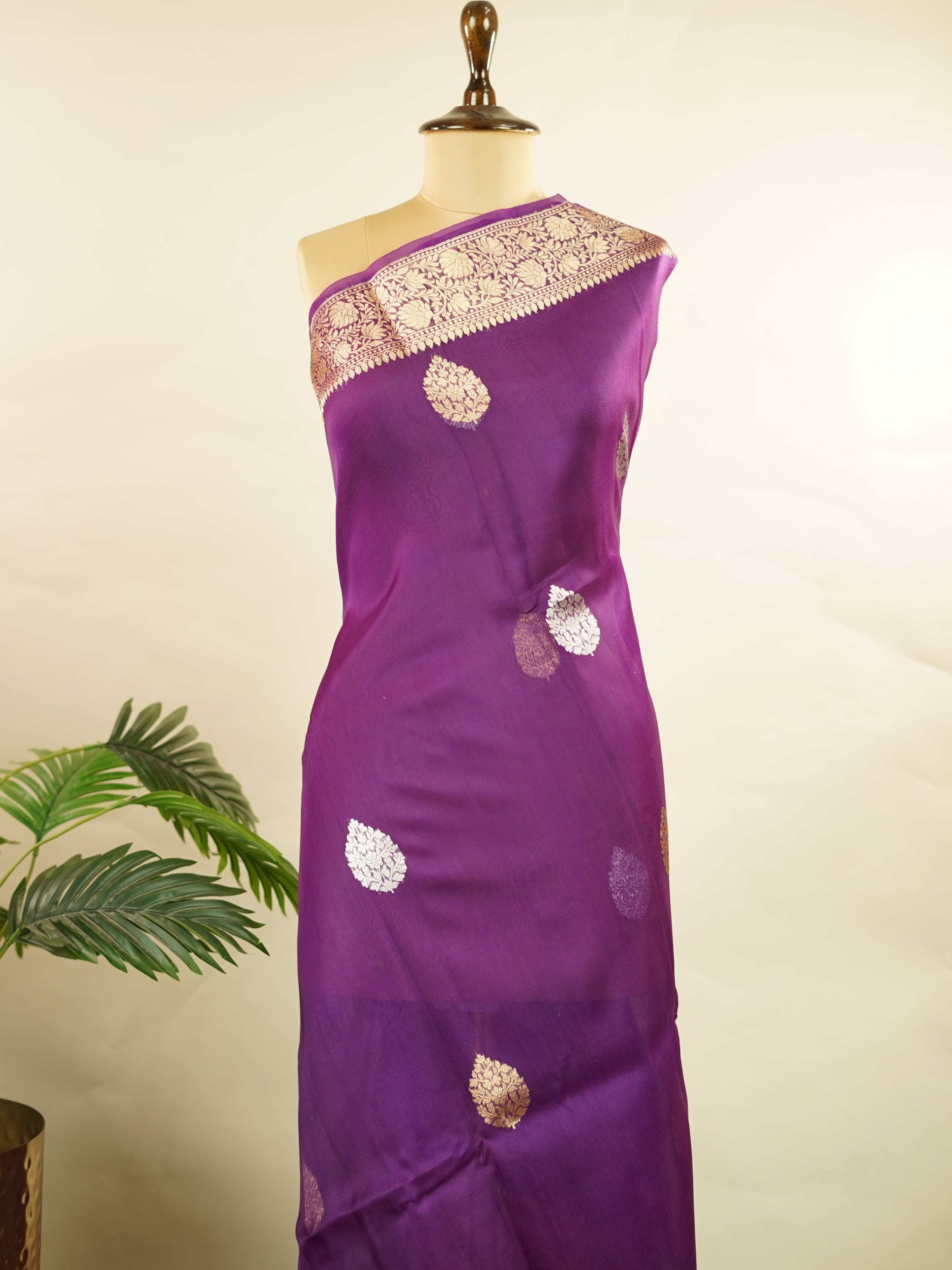 Katan This kora saree features delicate woven buttis and offers a light, comfortable drape. Rama - Banarasi Kora Saree | Woven Buttas - Manoranjitham Weaves - Handloom Store