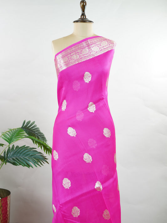 Katan This kora saree features delicate woven buttis and offers a light, comfortable drape. Swati - Manoranjitham Weaves - Handloom Store