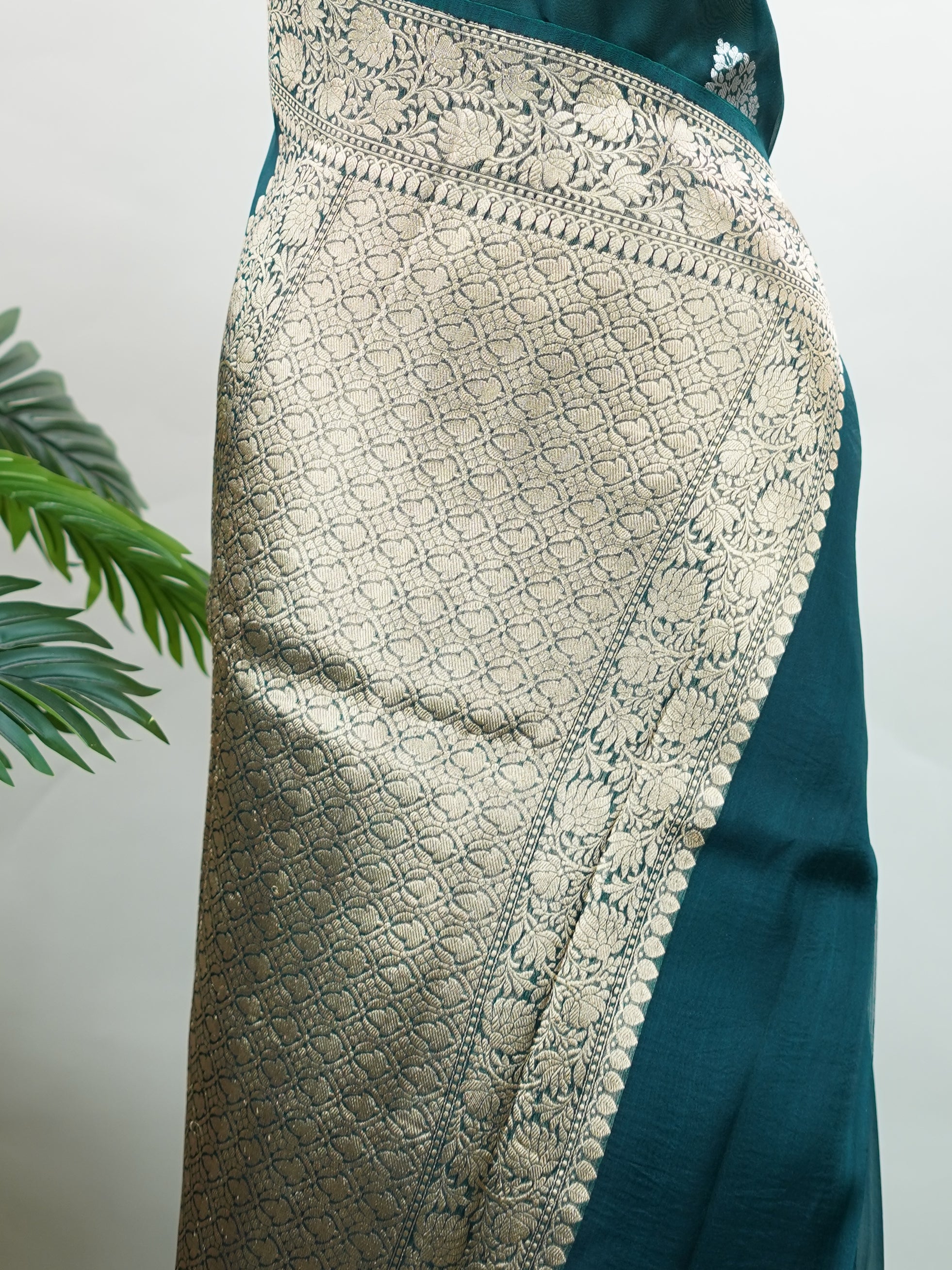 Katan This kora saree features delicate woven buttis and offers a light, comfortable drape. Saranga - Banarasi Kora Saree | Woven Buttas - Manoranjitham Weaves - Handloom Store