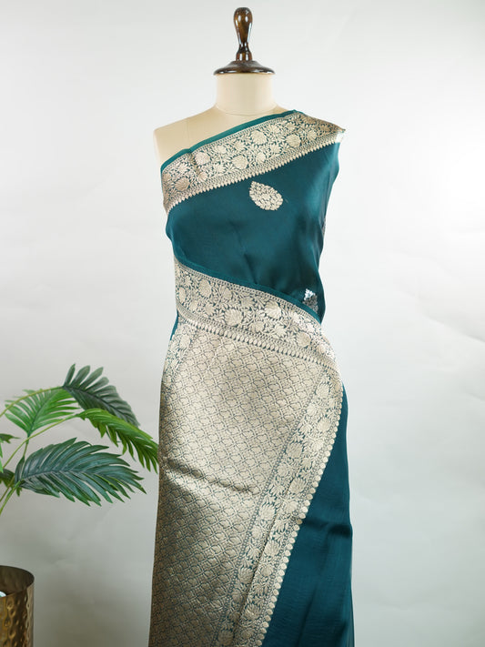 Katan This kora saree features delicate woven buttis and offers a light, comfortable drape. Saranga - Manoranjitham Weaves - Handloom Store