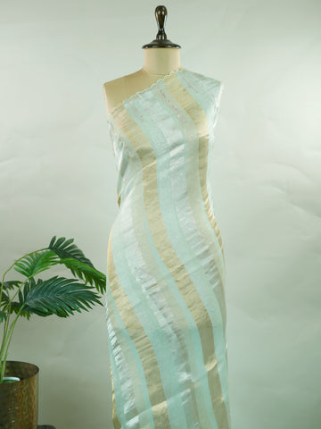 Organza This elegant organza saree features beautiful Ari Pita work on a refreshing sea green body.br data-start=91 data-end=94The border is finely detailed with intricate embroidery, adding a delicate traditional charm.br data-start=187 data-end=190The pallu showcases rich Ari Pita craftsmanship, enhancing its graceful and artistic appeal.br data-start=282 data-end=285Perfect for festive and special occasions, it reflects a light, airy, and elegant ethnic look. Subha - Organza Saree | Embroidered - Manoran
