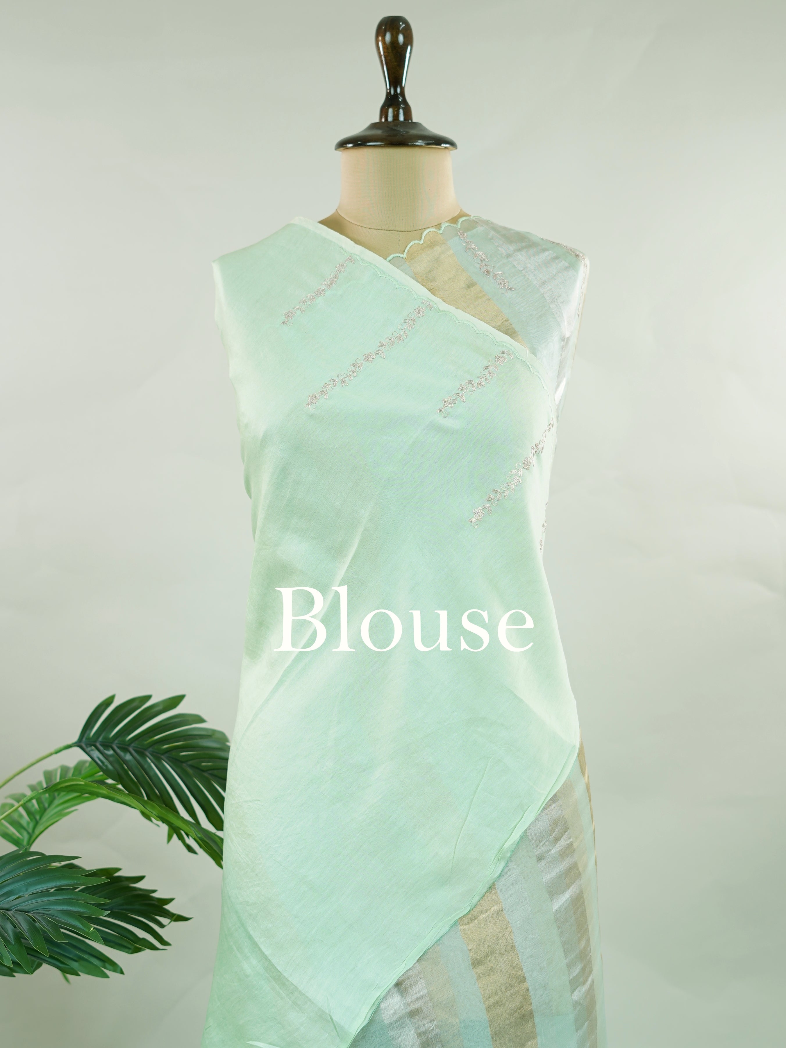 Organza This elegant organza saree features beautiful Ari Pita work on a refreshing sea green body.br data-start=91 data-end=94The border is finely detailed with intricate embroidery, adding a delicate traditional charm.br data-start=187 data-end=190The pallu showcases rich Ari Pita craftsmanship, enhancing its graceful and artistic appeal.br data-start=282 data-end=285Perfect for festive and special occasions, it reflects a light, airy, and elegant ethnic look. Subha - Organza Saree | Embroidered - Manoran
