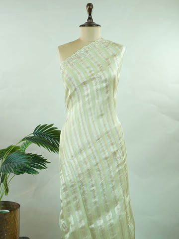 Organza Elegant sea green organza saree featuring intricate Aari Peeta work on the beautifully designed pallu.The lightweight, sheer fabric drapes gracefully, offering a fresh and refined look. Delicate handcrafted embroidery adds richness, texture, and traditional charm.br data-start=269 data-end=272Perfect for festive occasions, weddings, and special celebrations with timeless elegance. Surabhya - Organza Saree | Embroidered - Manoranjitham Weaves - Handloom Store