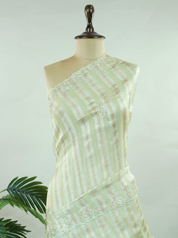 Organza Elegant sea green organza saree featuring intricate Aari Peeta work on the beautifully designed pallu.The lightweight, sheer fabric drapes gracefully, offering a fresh and refined look. Delicate handcrafted embroidery adds richness, texture, and traditional charm.br data-start=269 data-end=272Perfect for festive occasions, weddings, and special celebrations with timeless elegance. Surabhya - Organza Saree | Embroidered - Manoranjitham Weaves - Handloom Store