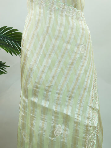 Organza Elegant sea green organza saree featuring intricate Aari Peeta work on the beautifully designed pallu.The lightweight, sheer fabric drapes gracefully, offering a fresh and refined look. Delicate handcrafted embroidery adds richness, texture, and traditional charm.br data-start=269 data-end=272Perfect for festive occasions, weddings, and special celebrations with timeless elegance. Surabhya - Organza Saree | Embroidered - Manoranjitham Weaves - Handloom Store