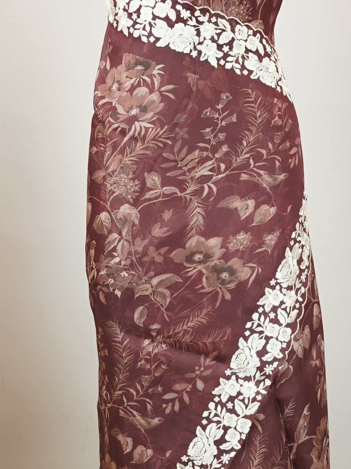 Organza A delicate Organza saree with digital prints and subtle embroidery, combining modern elegance with graceful charm. Lalitambika - Organza Saree | Digital Print - Manoranjitham Weaves - Handloom Store