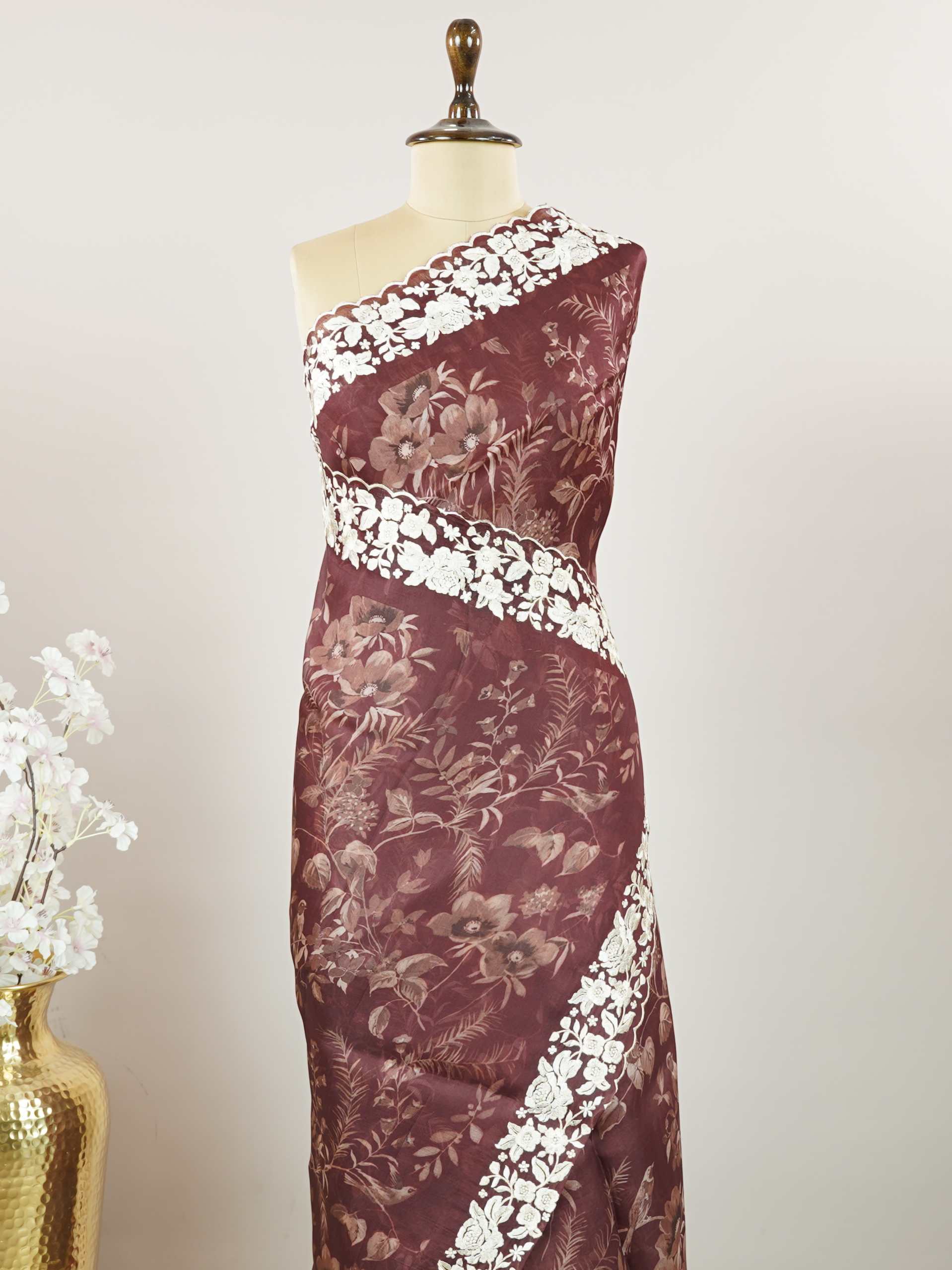 Organza A delicate Organza saree with digital prints and subtle embroidery, combining modern elegance with graceful charm. Lalitambika - Organza Saree | Digital Print - Manoranjitham Weaves - Handloom Store