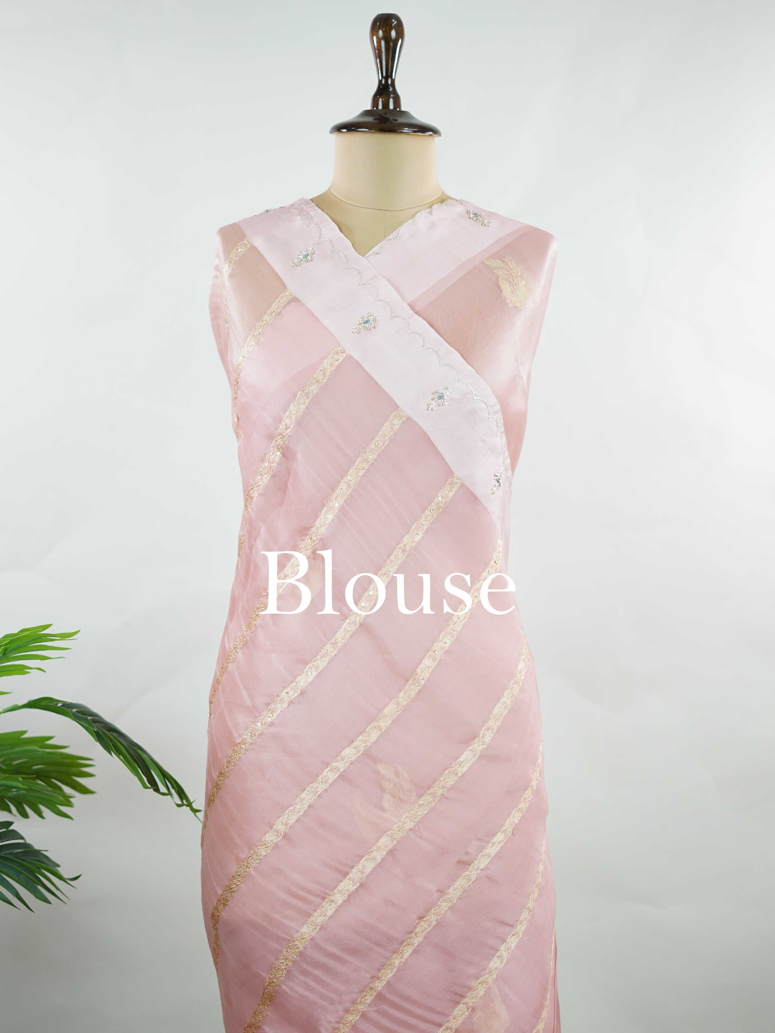 Organza Graceful peach organza saree embellished with intricate embroidery for an elegant appeal.br data-start=89 data-end=92The lightweight, sheer fabric drapes beautifully, creating a soft and feminine look.br data-start=176 data-end=179Delicate embroidered details enhance its charm with a touch of sophistication.br data-start=257 data-end=260An ideal choice for weddings, festive celebrations, and special occasions. Kalindiya - Organza Saree | Embroidered - Manoranjitham Weaves - Handloom Store