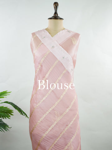 Organza Graceful peach organza saree embellished with intricate embroidery for an elegant appeal.br data-start=89 data-end=92The lightweight, sheer fabric drapes beautifully, creating a soft and feminine look.br data-start=176 data-end=179Delicate embroidered details enhance its charm with a touch of sophistication.br data-start=257 data-end=260An ideal choice for weddings, festive celebrations, and special occasions. Kalindiya - Organza Saree | Embroidered - Manoranjitham Weaves - Handloom Store