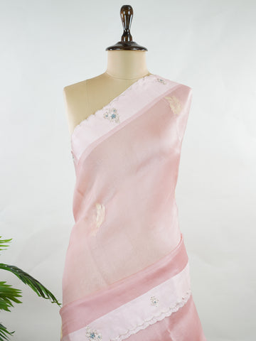 Organza Graceful peach organza saree embellished with intricate embroidery for an elegant appeal.br data-start=89 data-end=92The lightweight, sheer fabric drapes beautifully, creating a soft and feminine look.br data-start=176 data-end=179Delicate embroidered details enhance its charm with a touch of sophistication.br data-start=257 data-end=260An ideal choice for weddings, festive celebrations, and special occasions. Kalindiya - Organza Saree | Embroidered - Manoranjitham Weaves - Handloom Store