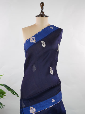 Organza Stunning dark blue organza saree adorned with elegant embroidery for a regal look.br data-start=82 data-end=85The sheer, lightweight fabric offers a graceful drape and effortless sophistication.br data-start=169 data-end=172Intricate embroidered work adds depth, texture, and timeless charm.br data-start=239 data-end=242Perfect for weddings, festive gatherings, and evening celebrations. Kiara - Organza Saree | Embroidered - Manoranjitham Weaves - Handloom Store