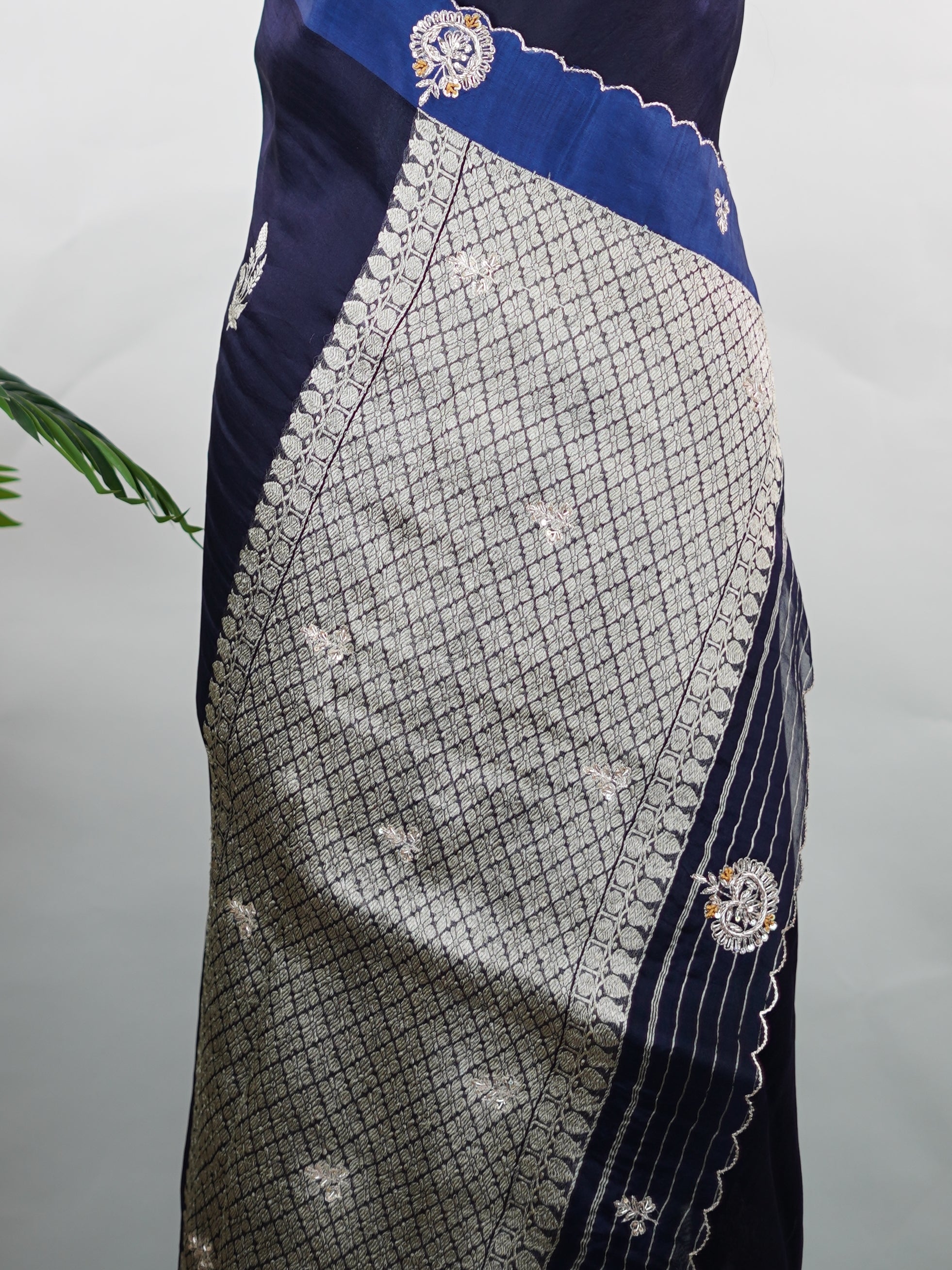 Organza Stunning dark blue organza saree adorned with elegant embroidery for a regal look.br data-start=82 data-end=85The sheer, lightweight fabric offers a graceful drape and effortless sophistication.br data-start=169 data-end=172Intricate embroidered work adds depth, texture, and timeless charm.br data-start=239 data-end=242Perfect for weddings, festive gatherings, and evening celebrations. Kiara - Organza Saree | Embroidered - Manoranjitham Weaves - Handloom Store