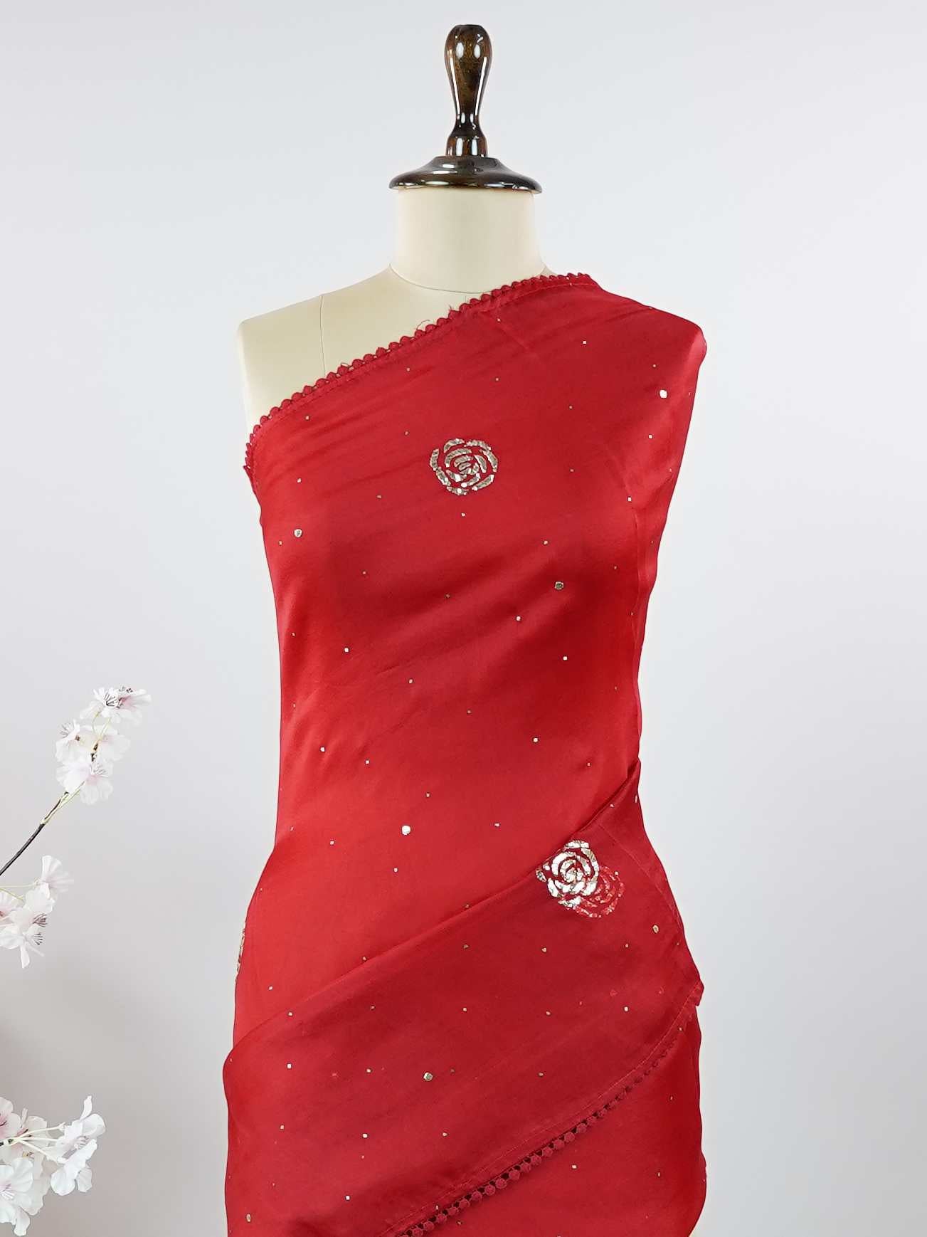 Organza Pure Organza saree in a rich maroon hue, adorned with intricate Mukesh work and exquisite Badla detailing.br
A luminous blend of heritage craftsmanship and graceful elegance, perfect for festive and occasion wear. Praseeda - Maroon Organza Saree | Mukesh Work - Manoranjitham Weaves - Handloom Store