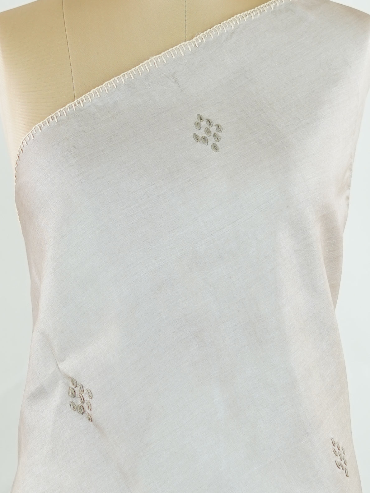 Tussar Tussar saree in a graceful grey shade with hand embroidery reflects subtle elegance and charm. The intricate hand-embroidered detailing adds a refined touch of traditional artistry.br data-start=183 data-end=186Its soft grey tone enhances the saree’s calm and sophisticated appeal. Paired with a matching grey blouse, it creates a timeless and graceful ethnic look. Mahika - Tussar Silk Saree | Hand Embroidered - Manoranjitham Weaves - Handloom Store