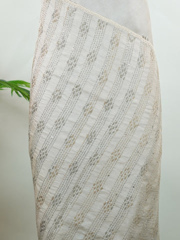 Tussar Tussar saree in a graceful grey shade with hand embroidery reflects subtle elegance and charm. The intricate hand-embroidered detailing adds a refined touch of traditional artistry.br data-start=183 data-end=186Its soft grey tone enhances the saree’s calm and sophisticated appeal. Paired with a matching grey blouse, it creates a timeless and graceful ethnic look. Mahika - Tussar Silk Saree | Hand Embroidered - Manoranjitham Weaves - Handloom Store
