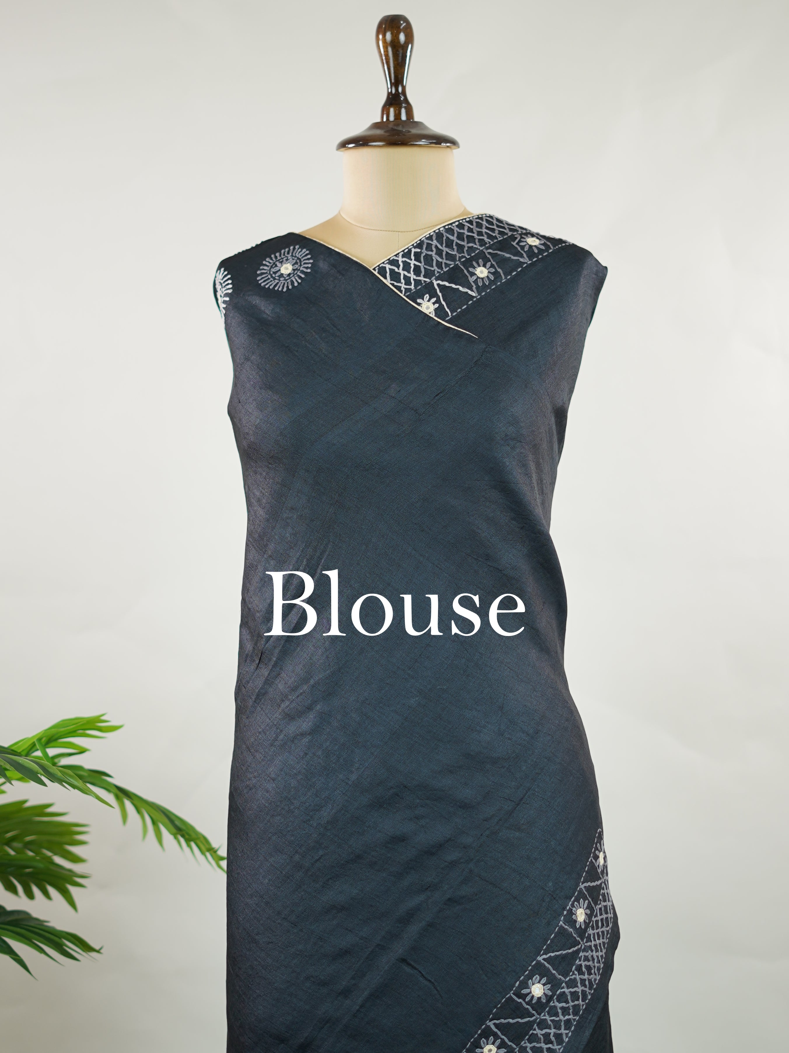 Tussar Rich Kutch embroidery beautifully highlights the heavy pallu with vibrant threads, intricate motifs, and signature mirror work, adding grandeur to the natural elegance of Tussar silk.

Balanced with a simple, subtly finished blouse, this saree creates the perfect blend of bold craftsmanship and graceful sophistication—ideal for festive and special occasions. Varnini - Tussar Silk Saree | Kutch Work - Manoranjitham Weaves - Handloom Store