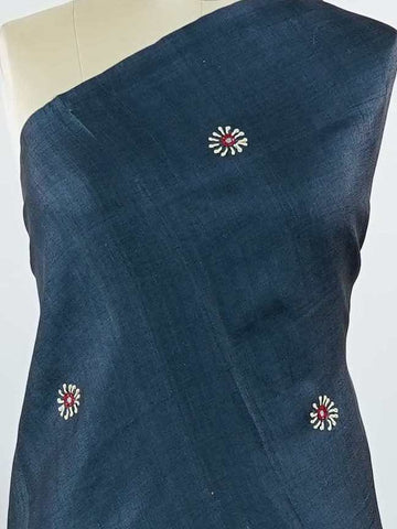 Tussar This elegant Tussar saree features detailed hand Kantha work that adds rich traditional artistry to the body. The pallu and blouse are enhanced with beautiful digital prints, creating a modern ethnic fusion look. The combination of handcrafted embroidery and digital design brings a unique visual balance. Perfect for festive and contemporary occasions, it reflects stylish elegance with traditional charm.
 Kanakangi - Tussar Silk Saree | Hand Embroidered - Manoranjitham Weaves - Handloom Store