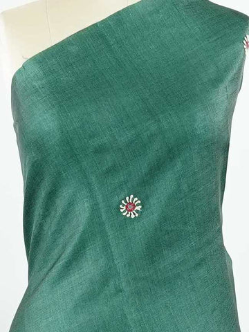Tussar This elegant Tussar saree features intricate hand Kantha work on a graceful green body.br data-start=87 data-end=90The pallu is beautifully enhanced with artistic detailing, adding rich traditional charm.br data-start=179 data-end=182The blouse comes with a stylish digital print, creating a modern ethnic fusion look.br data-start=266 data-end=269Perfect for festive and special occasions, it blends handcrafted elegance with contemporary design. Indumati - Tussar Silk Saree | Hand Embroidered - Manoran