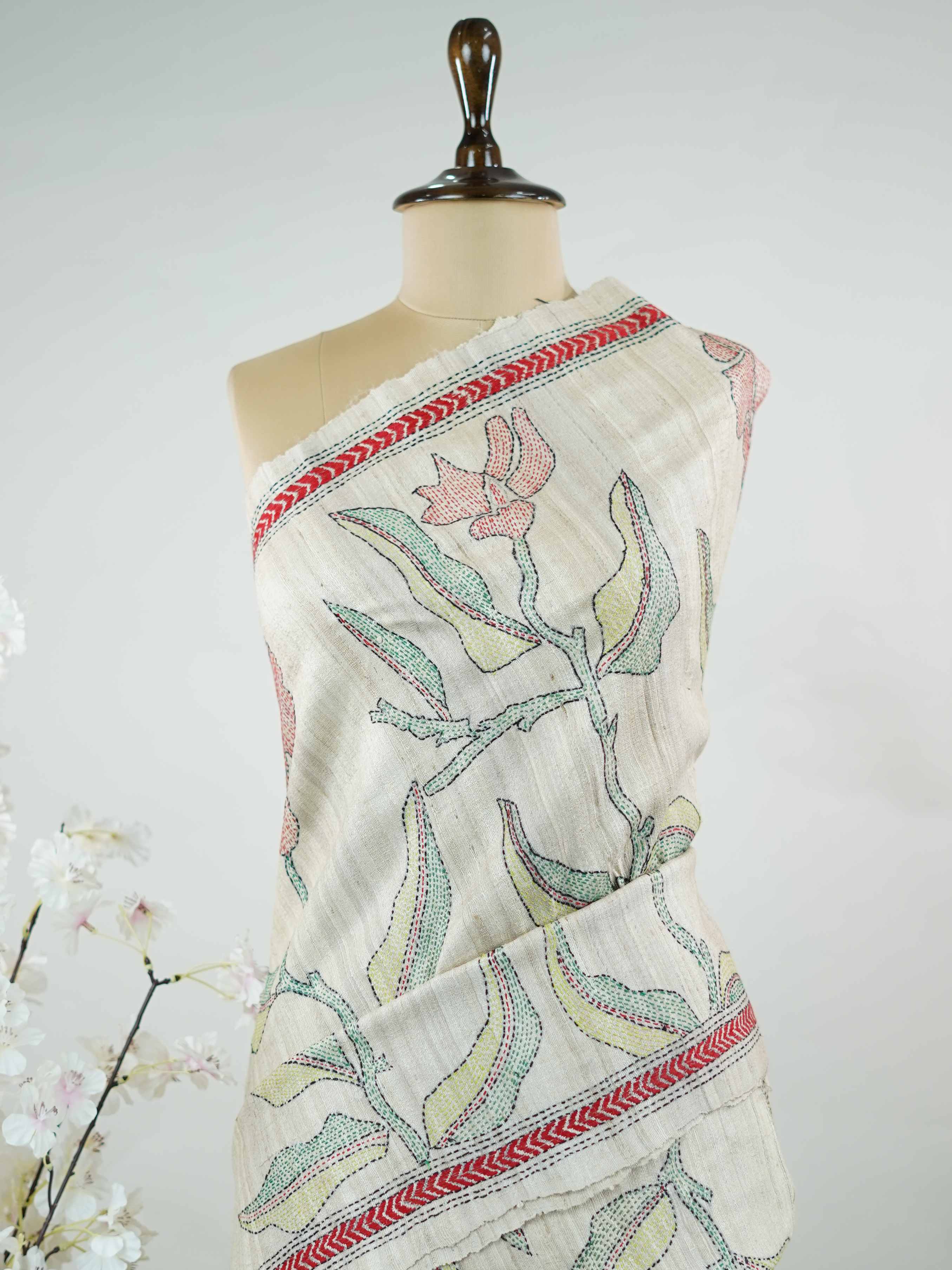 Tussar A  Tussar saree in an elegant cream tone, showcasing a natural texture and subtle sheen.br
Finished with delicate Katha embroidery, it blends earthy charm with understated sophistication. Vadana - Cream Tussar Silk Saree | Katha Embroidery - Manoranjitham Weaves - Handloom Store