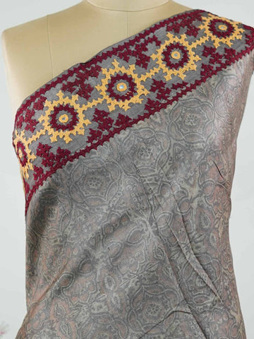 Tussar A refined Tussar saree in a rich grey base, highlighted with striking red accents for a bold contrast.br
Adorned with intricate Kutch embroidery, it celebrates vibrant craftsmanship with a timeless appeal. Priya - Grey Tussar Silk Saree | Kutch Work - Manoranjitham Weaves - Handloom Store