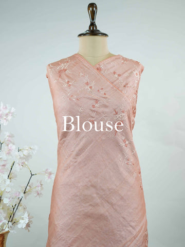 Tussar A soft peach Tussar saree in a soothing tone-on-tone palette, exuding understated elegance.br
Enhanced with delicate embroidery, it offers a graceful blend of simplicity and charm. Kalaroopa - Peach Tussar Silk Saree | Hand Embroidered - Manoranjitham Weaves - Handloom Store