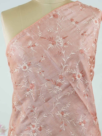 Tussar A soft peach Tussar saree in a soothing tone-on-tone palette, exuding understated elegance.br
Enhanced with delicate embroidery, it offers a graceful blend of simplicity and charm. Kalaroopa - Peach Tussar Silk Saree | Hand Embroidered - Manoranjitham Weaves - Handloom Store