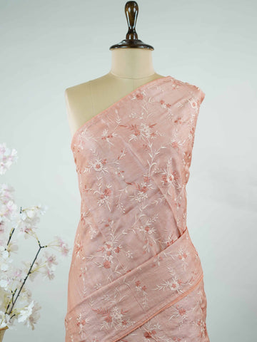 Tussar A soft peach Tussar saree in a soothing tone-on-tone palette, exuding understated elegance.br
Enhanced with delicate embroidery, it offers a graceful blend of simplicity and charm. Kalaroopa - Peach Tussar Silk Saree | Hand Embroidered - Manoranjitham Weaves - Handloom Store