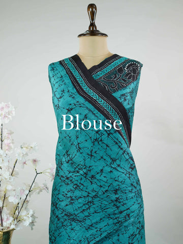 Tussar A striking blue soft silk saree paired with deep black accents, creating a bold and elegant contrast.br
Detailed with fine Kantha stitching and modern digital prints, it beautifully blends heritage craft with contemporary style. Varuni - Tussar Silk Saree | Kantha Embroidery - Manoranjitham Weaves - Handloom Store