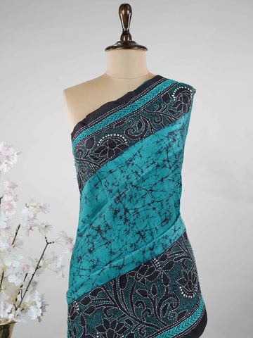 Tussar A striking blue soft silk saree paired with deep black accents, creating a bold and elegant contrast.br
Detailed with fine Kantha stitching and modern digital prints, it beautifully blends heritage craft with contemporary style. Varuni - Tussar Silk Saree | Kantha Embroidery - Manoranjitham Weaves - Handloom Store