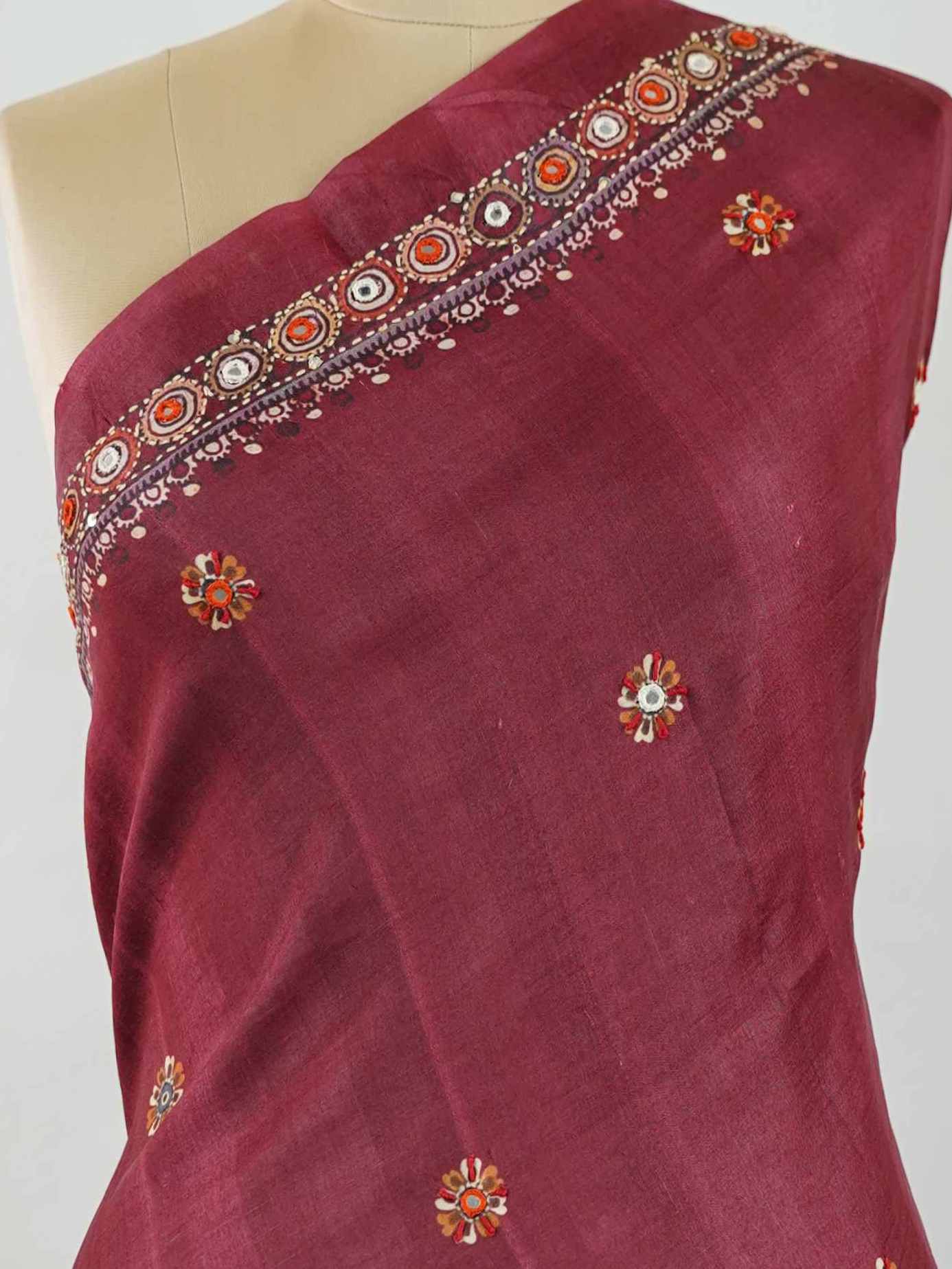Tussar Maroon Tussar silk body paired with a serene cream pallu and blouse, highlighted by intricate Radha Krishna embroidery.br
A graceful harmony of devotion and contrast, blending rich tones with timeless artistry. Kishori - Maroon Tussar Silk Saree | Radha Krishna Embroidery - Manoranjitham Weaves - Handloom Store