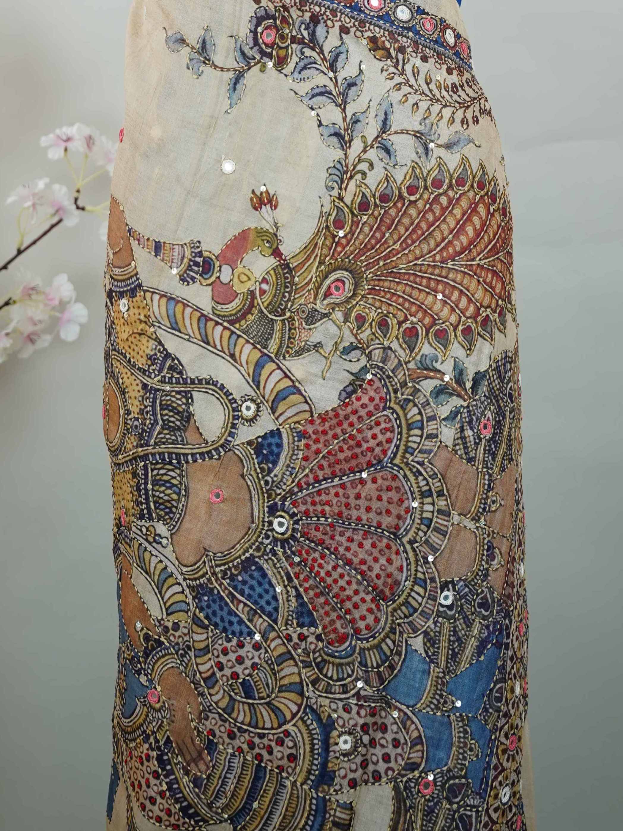 Tussar Ink blue Tussar silk body paired with a serene cream pallu and blouse, highlighted by intricate Radha Krishna embroidery.br
A graceful harmony of devotion and contrast, blending deep hues with timeless artistry. Shyama - Ink Blue Tussar Silk Saree | Radha Krishna Embroidery - Manoranjitham Weaves - Handloom Store