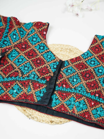 Tussar This elegant black Tussar blouse features finely stitched hand Kantha work across both front and back. The intricate embroidery showcases rich traditional craftsmanship with detailed artistic patterns. The deep black shade enhances the Kantha work, giving it a bold and timeless appeal. Perfect for ethnic wear, it creates a striking, elegant, and beautifully handcrafted traditional look Mrinalini - Tussar Silk Saree | Hand Embroidered - Manoranjitham Weaves - Handloom Store