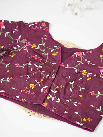 Tussar This elegant dark wine Tussar designer blouse features finely stitched contrast hand embroidery work. The front and back are fully adorned with rich embroidery, showcasing detailed craftsmanship. The deep wine shade enhances the intricate design, giving it a regal and graceful appeal. Perfect for ethnic wear, it creates a bold, stylish, and beautifully handcrafted traditional look. Shobhita - Tussar Silk Saree | Hand Embroidered - Manoranjitham Weaves - Handloom Store
