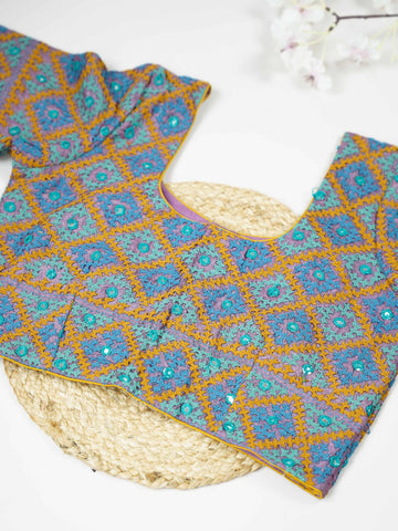 Tussar This elegant blue Tussar blouse features finely stitched hand Kantha work across both front and back. The intricate embroidery adds rich texture and showcases traditional craftsmanship beautifully. Its deep blue shade enhances the detailed Kantha design with a graceful and striking appeal. Perfect for ethnic wear, it offers a complete and stylish handcrafted look from every angle. Sukanya - Tussar Silk Saree | Hand Embroidered - Manoranjitham Weaves - Handloom Store
