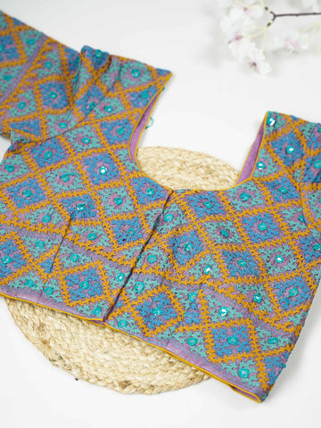 Tussar This elegant blue Tussar blouse features finely stitched hand Kantha work across both front and back. The intricate embroidery adds rich texture and showcases traditional craftsmanship beautifully. Its deep blue shade enhances the detailed Kantha design with a graceful and striking appeal. Perfect for ethnic wear, it offers a complete and stylish handcrafted look from every angle. Sukanya - Tussar Silk Saree | Hand Embroidered - Manoranjitham Weaves - Handloom Store