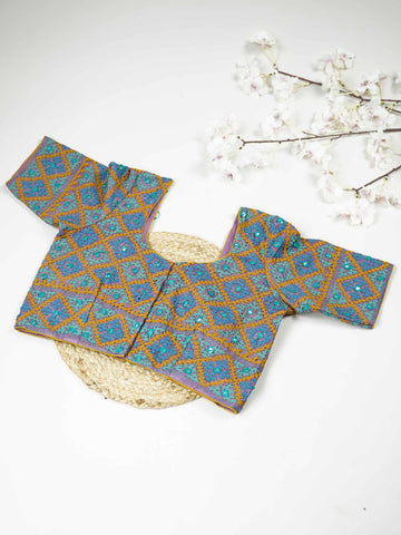 Tussar This elegant blue Tussar blouse features finely stitched hand Kantha work across both front and back. The intricate embroidery adds rich texture and showcases traditional craftsmanship beautifully. Its deep blue shade enhances the detailed Kantha design with a graceful and striking appeal. Perfect for ethnic wear, it offers a complete and stylish handcrafted look from every angle. Sukanya - Tussar Silk Saree | Hand Embroidered - Manoranjitham Weaves - Handloom Store