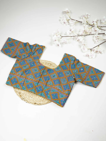 Tussar This elegant blue Tussar blouse features finely stitched hand Kantha work across both front and back. The intricate embroidery adds rich texture and showcases traditional craftsmanship beautifully. Its deep blue shade enhances the detailed Kantha design with a graceful and striking appeal. Perfect for ethnic wear, it offers a complete and stylish handcrafted look from every angle. Sukanya - Tussar Silk Saree | Hand Embroidered - Manoranjitham Weaves - Handloom Store