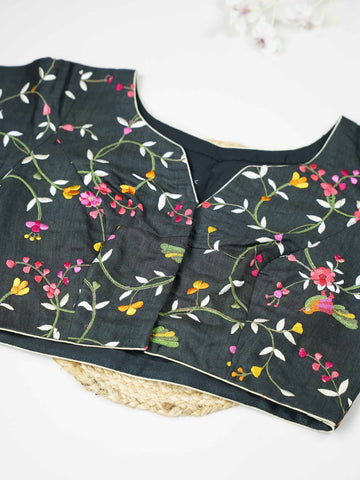 Tussar This elegant black Tussar blouse features finely stitched hand embroidery work.br data-start=79 data-end=82The front and back are beautifully decorated with delicate floral designs, adding timeless charm. The intricate flower motifs highlight rich craftsmanship and elegant traditional artistry. Perfect for ethnic wear, it creates a bold, graceful, and stylish traditional look Vihana - Tussar Silk Saree | Hand Embroidered - Manoranjitham Weaves - Handloom Store