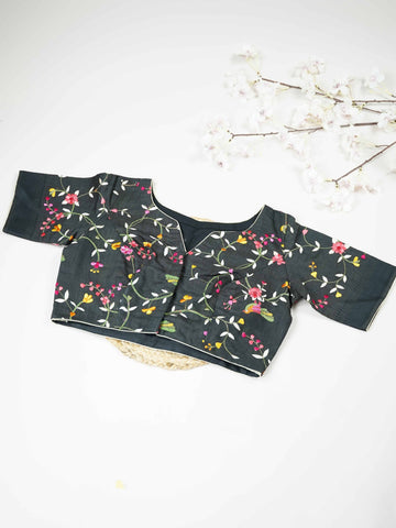 Tussar This elegant black Tussar blouse features finely stitched hand embroidery work.br data-start=79 data-end=82The front and back are beautifully decorated with delicate floral designs, adding timeless charm. The intricate flower motifs highlight rich craftsmanship and elegant traditional artistry. Perfect for ethnic wear, it creates a bold, graceful, and stylish traditional look Vihana - Tussar Silk Saree | Hand Embroidered - Manoranjitham Weaves - Handloom Store