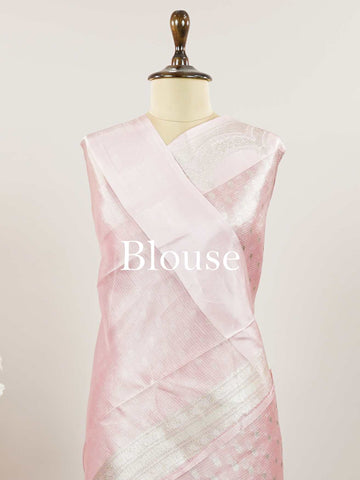 Tissue A Tissue saree is the perfect blend of delicate silk and shimmering zari, woven to create an ethereal, translucent fabric that sparkles with every movement. Lightweight and luxurious, it’s ideal for grand occasions and celebrations where elegance is key. Draped in a Tissue saree, you embody timeless glamour with a modern twist. Abhogi - Banarasi Tissue Kora Saree - Manoranjitham Weaves - Handloom Store
