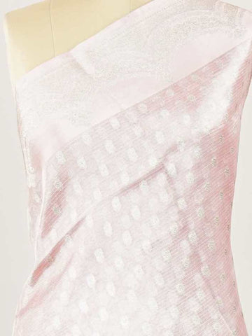 Tissue A Tissue saree is the perfect blend of delicate silk and shimmering zari, woven to create an ethereal, translucent fabric that sparkles with every movement. Lightweight and luxurious, it’s ideal for grand occasions and celebrations where elegance is key. Draped in a Tissue saree, you embody timeless glamour with a modern twist. Abhogi - Banarasi Tissue Kora Saree - Manoranjitham Weaves - Handloom Store